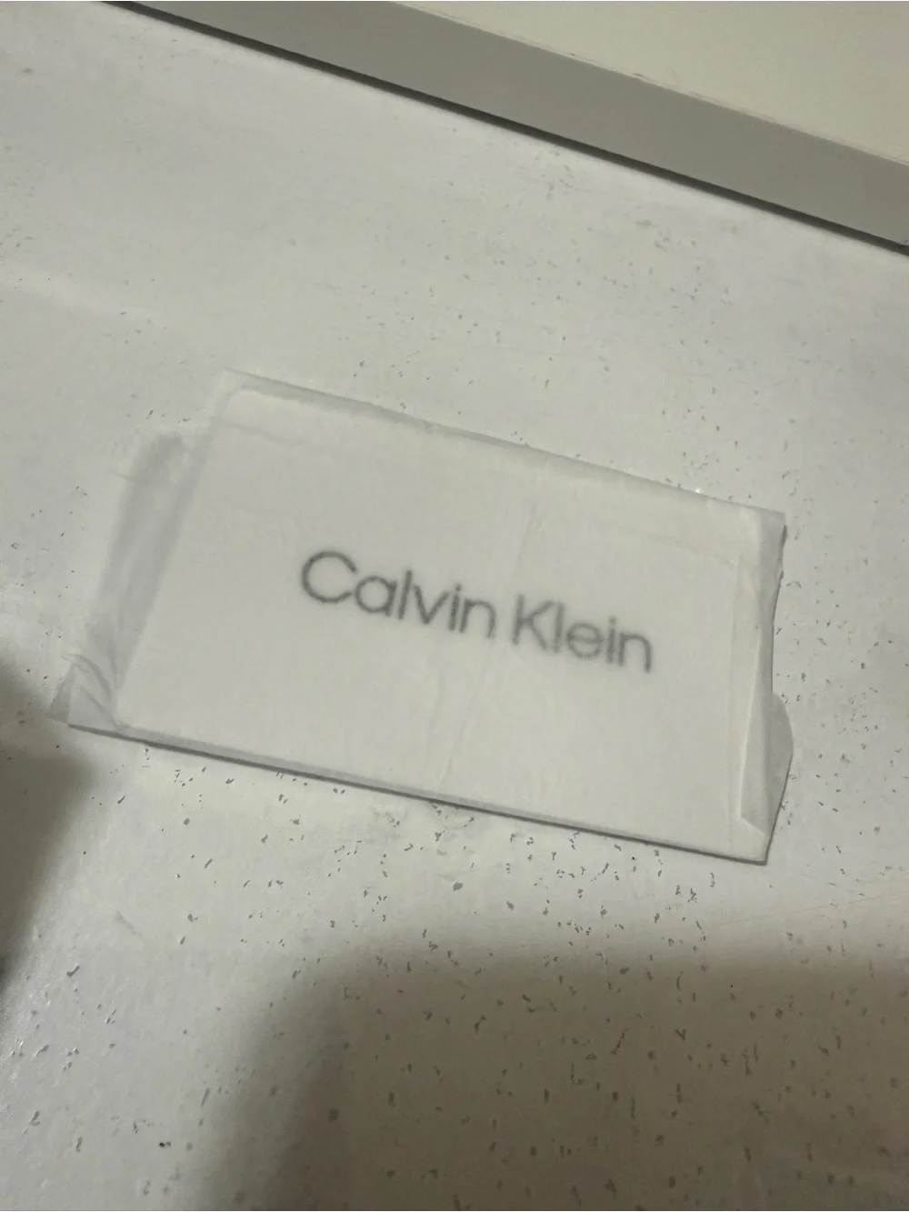 Calvin Klein Burgundy Zipper wallet with Embossed CK brand new